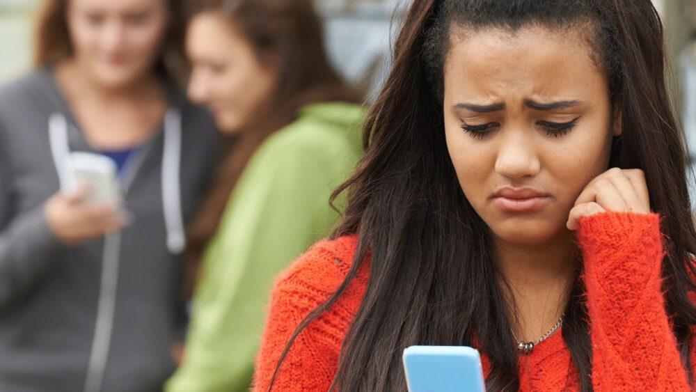 Teens are often the perpetrators of creating and sharing deepfake nudes with their classmates. Photo: Highway Starz/Getty Images Pro.