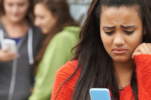 Teens are often the perpetrators of creating and sharing deepfake nudes with their classmates. Photo: Highway Starz/Getty Images Pro.